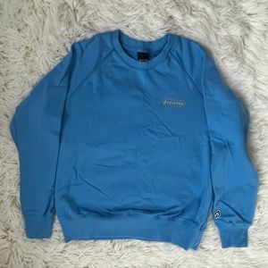 Peloton crew neck blue sweatshirt. Size Small.